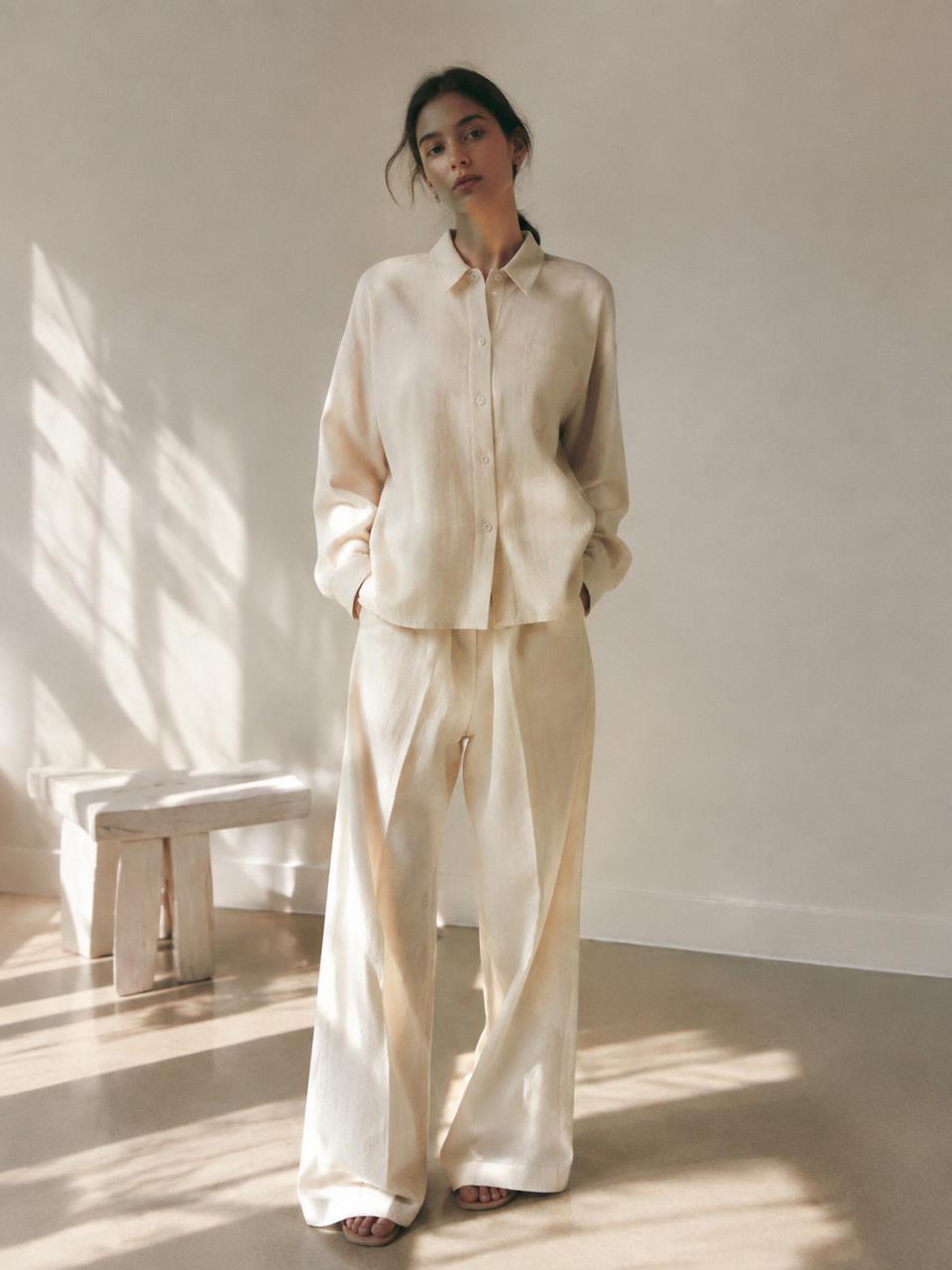 Full-length raw cotton set in window light